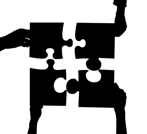 Hands holding puzzle pieces on transparent background