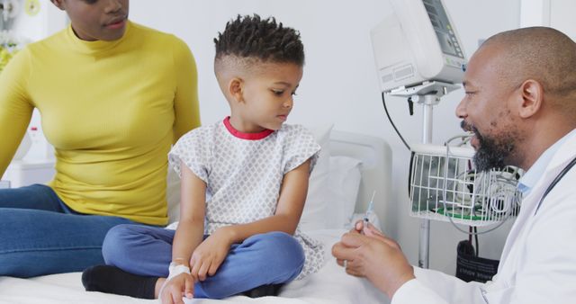 Doctor Administering Vaccine to Child in Hospital with Mother - Download Free Stock Images Pikwizard.com