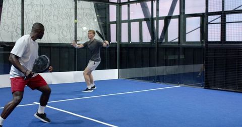 Energetic Game of Padel on Modern Indoor Court