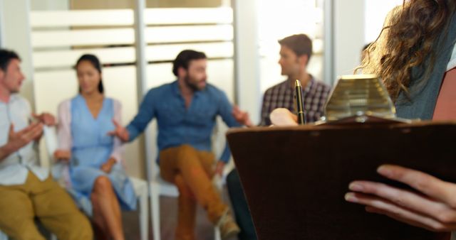 Therapist Leading Group Therapy Session in Office Setting - Download Free Stock Images Pikwizard.com