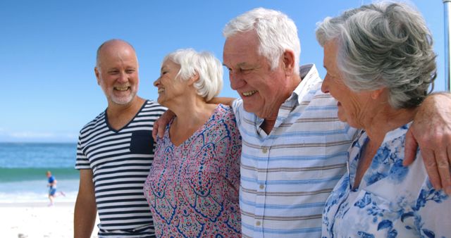 Happy Group of Senior Friends Enjoying Day at Beach - Download Free Stock Images Pikwizard.com