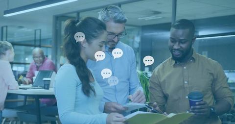 Diverse team collaborating in modern open office setting