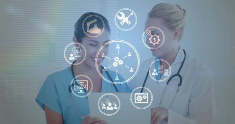 Female doctors discussing with digital medical interface icons