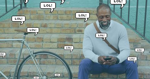 Senior Man Enjoying Social Media on Smartphone Outdoors