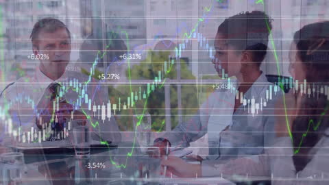 Diverse Business Team Analyzing Financial Trends with Graph Overlay