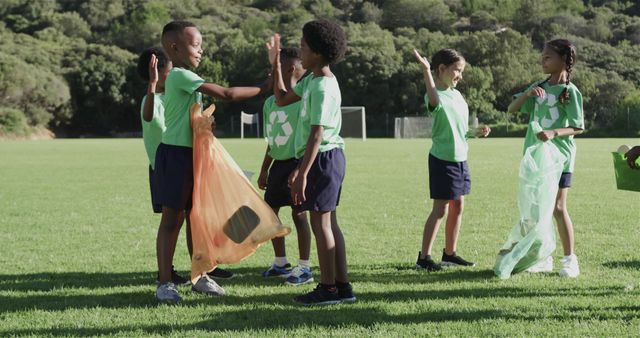 Diverse Kids Cleaning Park with Enthusiasm - Download Free Stock Images Pikwizard.com