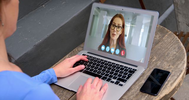 Woman Video Conferencing on Laptop from Outdoor Patio - Download Free Stock Images Pikwizard.com