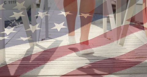 Overlay of American Flag and Woman Walking on Pier