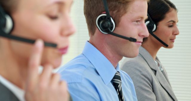 Customer Service Representatives Using Headsets in Professional Call Center - Download Free Stock Images Pikwizard.com