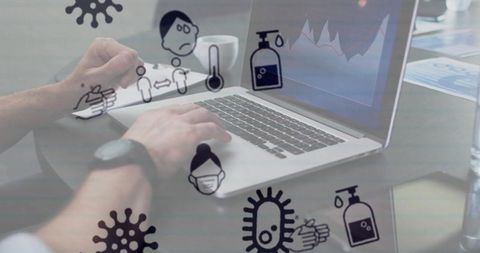 Man Working on Laptop with Health Icons Connection