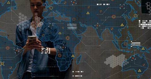 Young man tapping smartphone activating futuristic global data overlay with hex grid interface