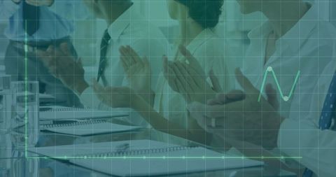 Business Team Applauding Data Presentation in Conference Room