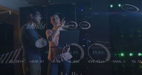 IT Engineers Collaborating in Data Center with Digital Interfaces