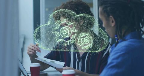 Diverse Colleagues Discussing Cloud Technology with Digital Interface