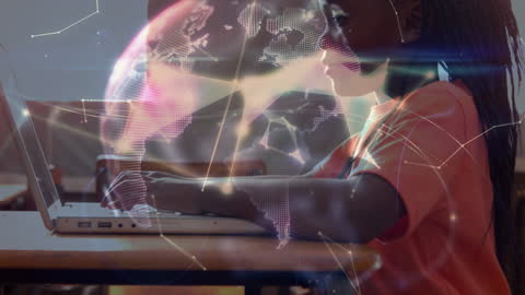 Schoolboy Engaging with Digital Global Connections on Laptop