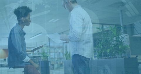 Business team collaborating on financial data insights in modern office
