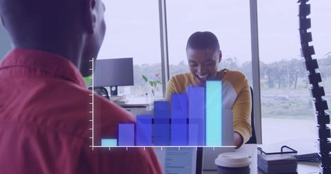 Colleagues Collaborating with Digital Data Interface