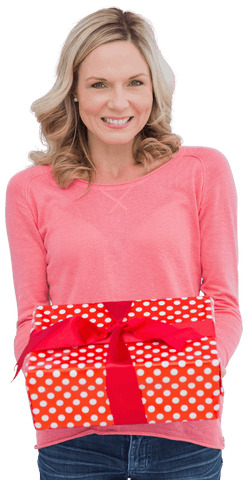 Smiling woman holding polka dot gift on transparent background