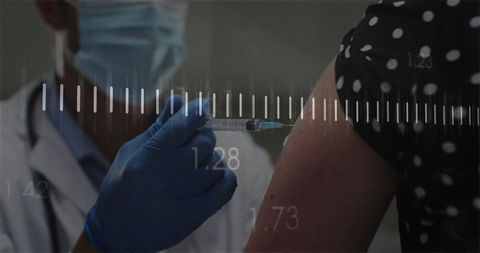 Medical professional administering vaccination in clinical setting