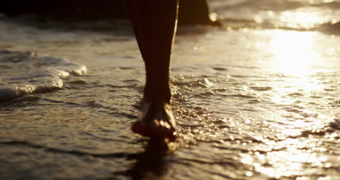 Barefoot Serenity Walking on Sunny Seashore