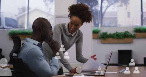 Business Team Collaborating on Data Processing Strategies in Modern Office