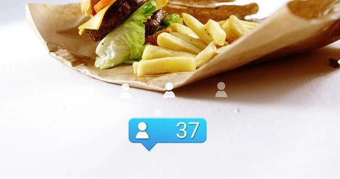 Burger and fries with social followers bubble, minimalist flatlay bright lifestyle