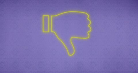 Yellow neon thumbs down icon on purple background