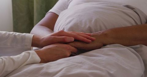 Compassionate Doctor Comforting Patient in Healthcare Setting