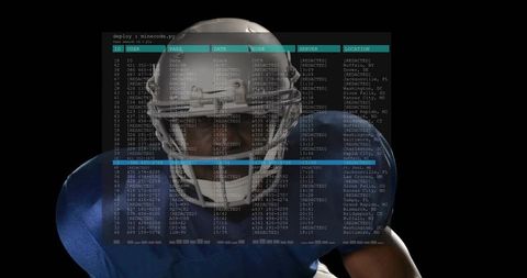Standing Football Player Wearing Blue Pads with Holographic Data Overlay and Terminal HUD