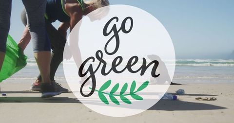 Volunteers collecting beach rubbish for environmental conservation