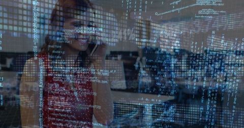 Businesswoman Engaging in Technology Conversation Amidst Financial Data