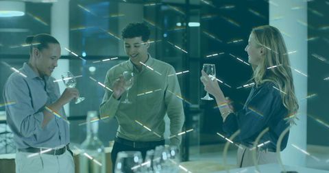 Colleagues networking over wine in modern office lounge celebrating team success and connection