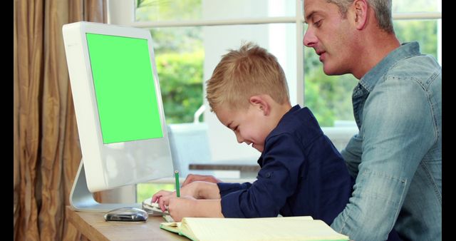 Father and Son Learning Together at Home with Computer - Download Free Stock Images Pikwizard.com