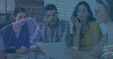 Team Analyzing Stock Market Trends at Office Desk