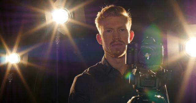 Male Photographer Behind Camera with Professional Lighting Setup - Download Free Stock Images Pikwizard.com