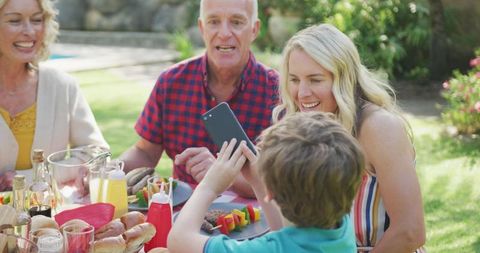 Joyful Family Gathering During Outdoor Garden Meal