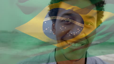 Person Smiling at Beach with Waving Brazilian Flag Overlay