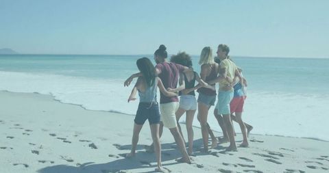 Group of Friends Walking on Beach Linked in Harmony