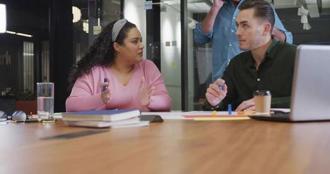 Professionals Brainstorming Innovative Ideas in Modern Office