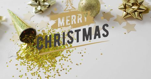 Christmas greeting with golden decorations and glitter