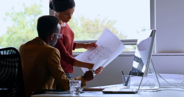 Architectural Team Reviewing Blueprints in Modern Office - Download Free Stock Images Pikwizard.com