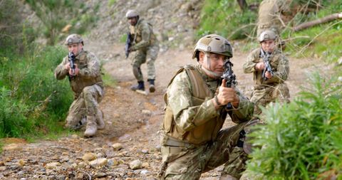 Soldiers Engaged in Outdoor Military Drill with Rifles - Download Free Stock Images Pikwizard.com