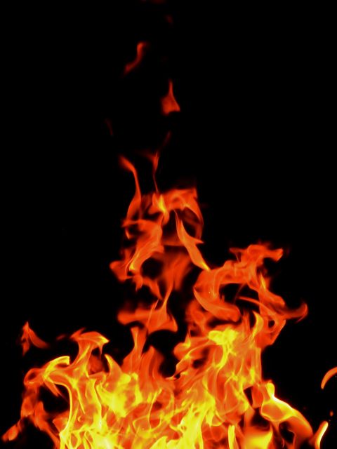 Bright Flames on Dark Background - Download Free Stock Photos Pikwizard.com