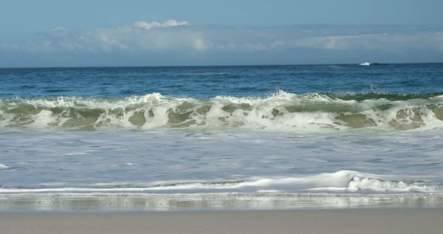 Powerful wave crashing on the beach in slow motion - Download Free Stock Photos Pikwizard.com