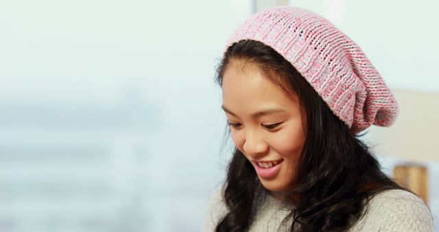 Smiling Young Woman Wearing Pink Knitted Beanie Hat - Download Free Stock Images Pikwizard.com