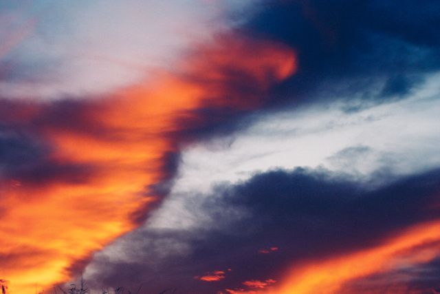 Dramatic Twilight Sky with Vivid Orange and Deep Blue Clouds - Download Free Stock Photos Pikwizard.com