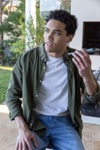 Man Enjoying Outdoor Phone Conversation