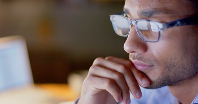 Focused Young Professional Working on Computer With Glasses - Download Free Stock Images Pikwizard.com