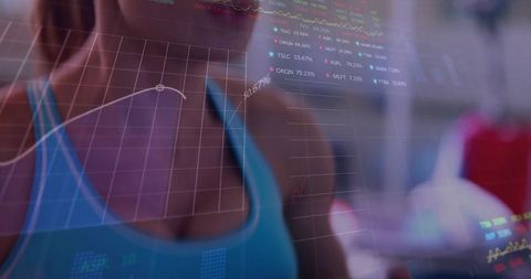 Athletic woman wearing teal sports top behind translucent analytics dashboard overlay