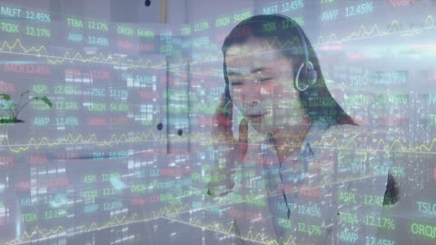 Businesswoman Analyzing Financial Data with Virtual Projections